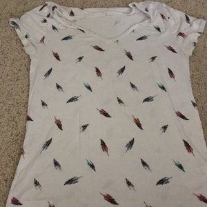 t-shirt with feathers on it